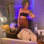Jenny Slate Instagram - Thank you everyone who came out to @the_wilbur last night, especially @marybethbarone who opened for me but was in the bathroom when i took this photo of myself w a bootle of beer loitering in front of my vagina. Also thank you to @rachelcomey for making these pants and bathing suit plus necklace that I wore together to equal one shirt, and @no6store for my prized possession which is this scrunchie. Mary Beth and I shall SEE U TONIGHT at The Town Hall in NYC, sweet babies!