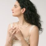 Jenny Slate Instagram – A tiny bit of MAGIC 🪡✨ We present to you a collection with our friend @jennyslate . A tender ode to baubles and braids from childhood, the passage of time, rings to wear after a heartbreak, a bell her mother tied to her shoelaces. “What if we all had a bell for our beloved?” Jenny asked.

Photography: @chloehorseman 
Video: @basilfauchier 
Stylist: @mrmontyjackson 
Makeup: @kirinstagram 
Hair: @anthonycampbellhair