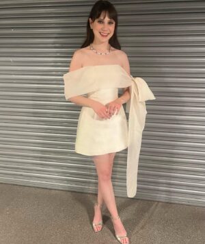 Jenny Walser Instagram - 🎀✨🎀✨🎀✨🎀✨🎀

@officialntas with the @heartstoppertv gang last night! 

Wearing @tranhungofficial @jimmychoo @boodles 

Styled by @rachaelperrystyling 
Assisted by @cristinascales_ @lula_mac 
Hair & Makeup by @nataliestokesmua 

And lastly, bringing the whole look together…
‘Kiosk shutter backdrop’ by Wembley Arena