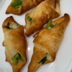 Jill Zarin Instagram - Asparagus puff pastry with Boursin cheese! Delicious!! 🤤 Simple and easy to make for a snack or appetizer! Made with love of course! I cant wait to share some of my homemade passover dishes with everyone! Stay tuned 👩🏼‍🍳🤍 Ingredients: asparagus, egg, Boursin cheese, pastry dough, boiled water, parm or mozzarella. Comment below on some dishes you would like to see me make! #easyrecepies #chefjill #boca #athomecooking