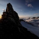 Jimmy Chin Instagram - The shot. Getting the shot. @kinleyaitken enjoying a breakfast of sun rays and coffee in the Waddington Range, British Columbia.