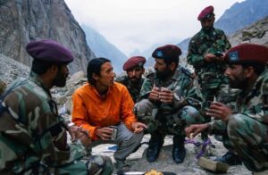 Jimmy Chin Instagram - In 2000, General Tahir of Pakistan’s Northern Command graciously offered to send a Pakistani special forces team to accompany @highsteph @davide_anderson @brady_robinson and me to the Kondus Valley. The area was rarely visited due to its proximity to the Siachen Glacier, where the world’s highest war had been waging for decades. We spent plenty of time trading stories with the soldiers, just like anyone else. They were curious about what our lives were like at home and we were curious about theirs. We ended up climbing a beautiful tower in the valley. We named the route “All Quiet on the Eastern Front” for the “thump thump” of shelling we could hear from our portaledge camps on the wall. We named the tower Tahir Tower after our gracious host.

First photo by @brady_robinson