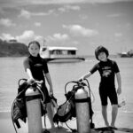 Jimmy Chin Instagram - Fam time is the best time… Happy New Year from Brazil! Sending much love and gratitude from the southern hemisphere ❤️🙏🏼 James and Marina have officially begun training to hang w uncle @paulnicklen and auntie @mitty! Stoke is high… Marina got her open water cert and James…well James got his always game for anything trying to keep up w his sis certification 😂 @chaivasarhelyi