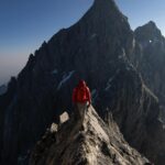 Jimmy Chin Instagram - “One of my favorite perspectives of the north face of the Grand Teton. Shot on Canon EOS R5 camera and EF 14mm f/2.8L II USM lens. @conrad_anker heading to the summit of Mount Owen.” - #CanonExplorerOfLight @jimmychin