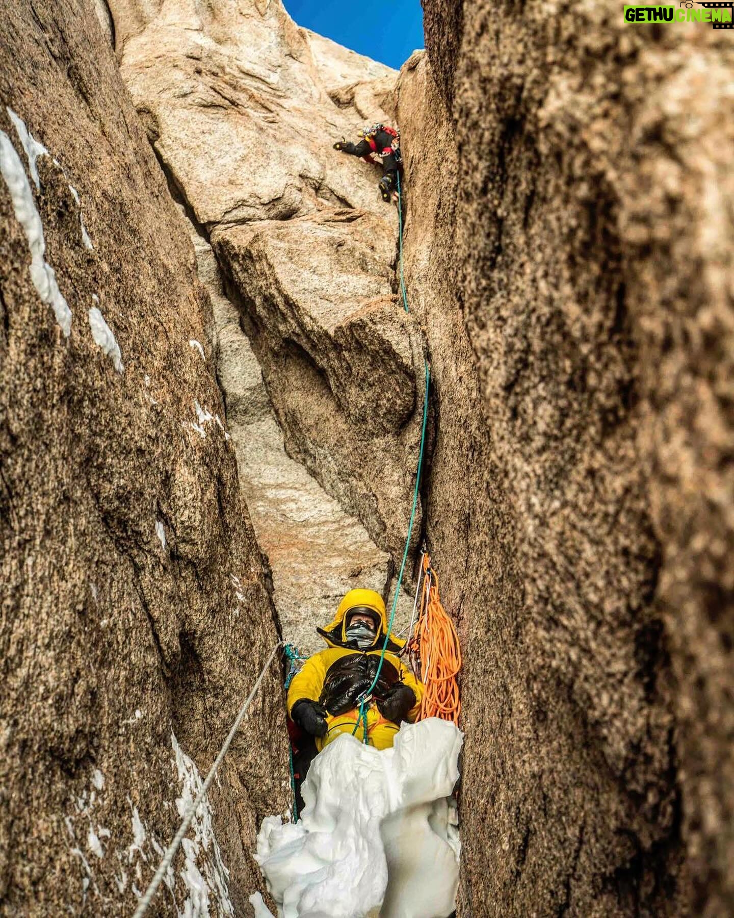 Jimmy Chin Instagram - @conrad_anker chillin’ at the icebox belay, contemplating his estranged relationship wiuth the sun while I toil above on Ulvetanna, back in 2017. Going in the shade in Antarctica meant a 10 degree drop in temps…which is normally fine…but when your base temp is -10 degrees F, it can be a little sad to leave the sun. Belay layering system on Ulvetanna = 3 base layers, synthetic puffy jacket, mid weight down jacket, big down parka, topped off with a really big down belay parka. I kept thinking about the kid in A Christmas Story. 📸 by @pablo_durana @thenorthface