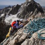 Jimmy Chin Instagram - I often take things for granted in the mountains since I’m usually focused on the climbing, efficiency, and speed. It was nice to be reminded by @brielarson to slow down and enjoy the first sun and warm rock of the day after a frigid morning and cold pitch below. I’d never thought of hugging the mountain before either (see the second shot) 😂 I think she was pretty stoked to be at the belay. This was from a 16-hour round-trip push on the Petzoldt Ridge of the Grand Teton. Proud first route on the GT for Brie and @risemovement. There may have been a little sandbagging involved... @dougworkman @chrisfigenshau @clairpopkin
