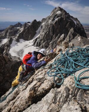 Jimmy Chin Instagram - I often take things for granted in the mountains since I’m usually focused on the climbing, efficiency, and speed. It was nice to be reminded by @brielarson to slow down and enjoy the first sun and warm rock of the day after a frigid morning and cold pitch below. I’d never thought of hugging the mountain before either (see the second shot) 😂 I think she was pretty stoked to be at the belay. This was from a 16-hour round-trip push on the Petzoldt Ridge of the Grand Teton. Proud first route on the GT for Brie and @risemovement. There may have been a little sandbagging involved...

@dougworkman @chrisfigenshau @clairpopkin