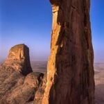 Jimmy Chin Instagram - When @kevin.thaw and @cedarwright and I camped in the Bandiagara Escarpment on our way to the Hand of Fatima, Mali, in 2004, we spent a few days with the local Dogon tribe, an ethnic group indigenous to the central plateau of Mali. Many of them lived in the cliff dwellings their ancestors had inhabited for over a milennium. Incredibly gracious, they invited us into their homes and gave us a glimpse into a different world from a different time.