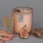 JoJo Instagram - Indulge your senses in my latest limited-edition offering, 𝘗𝘳𝘰𝘴𝘦𝘤𝘤𝘰 𝘗𝘢𝘭𝘰 𝘚𝘢𝘯𝘵𝘰 aka *baby, it’s you*. We combined some of my favorite scents to make a truly sexxyyyy candle. Encapsulated in a coconut soy wax massage oil blend (yes you can use it on your body, baby!) are top notes of sweet amber, dry prosecco, and palo santo. Middle notes are clove, Lilly of the Valley, and a touch of citrus. Grounding base notes evoke a rich mahogany and musk. We are featuring a gorgeous hand- chosen and cleansed sardonyx or apricot agate stone. Sardonyx promotes stability, protection, and happiness. It can attract friends and good fortune and is also known to increase stamina, vigor, and self-control. All important characteristics to employ whether you’re on a self-love journey or in a partnership. Apricot agate is a powerful yet gentle crystal which brings harmony to your energy as well as strength, vitality, and stamina. Our translucent desert rose- colored vessel is reusable and I encourage you to enjoy both the stone and the vessel long after the wax has melted. link in bio ✨🕯️