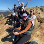 JoJo Instagram - Where do I even begin about the past week?! Hiked 60 miles (more than I ever have in my life) with total strangers. The blisters on my feet prove it 😂. Yoga twice a day. Ate green clean and lean. Gained a new appreciation for my own backyard (Southern California) and lost a few pounds along the way. I had the tremendous privilege of being able to take 6 days away from my phone, emails, regular responsibilities, stimulation, and late night binge eating patterns I had gotten back into over the past few months. Through a practice of hiking 8-12 miles per days and consciously moving and nourishing my body I feel a massive burst of clarity and gratitude. My body, mind, and spirit feel renewed and rejuvenated. Now, nobody has time to do that shit everyday. It’s just not possible in the world we live in! This post is just to encourage you to stretch and move the one bod you got. Get out into nature if/ when you can. I know it’s cold in much of the world!! But when you CAN. It’s often the last thing we want to do. But it makes a damn difference. One of the women I met turned 79 on on the trail. She is more vital and alive and fit than I’ve ever been. Im so inspired. She is goals. And please don’t forget to BREATHE: slowly, deeply, fully. Practice opening your heart. Even though circumstances and history have taught many of us to close off and protect ourselves. It feels so much better not to be on the defense but instead be curious. To go through the pain and unpredictability and be proud of how we handled it. And to eat real food. Of course, literally: do whatever the hell you want 🤍 But I just wanted to encourage you in what I’ve come to find makes me feel most vital and alive over the years. If this sounds woo woo to you then welcome to the freak show baby 😂 After my father passed years ago from addiction/ morbid obesity/ overall poor health it’s become a passion to experience well-being and share what I learn along the way. Wherever you are in your journey I’m right by your side, cheering you on. Mad love, Joanna. cc: @theashram