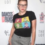 Jodie Sweetin Instagram - @jodiesweetin and our notorious RBG Pop Art Tee hit the red carpet🍿🎬 Look Good. Do Good. Change the world. 10% of every purchase is donated to our selected partnered nonprofits fighting real-issues! 🌎🤍