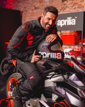 John Abraham Instagram - Welcome to the Racing Squad! 🔥

Excited to announce @thejohnabraham as the newest member of the Aprilia India family. Thrilled to have a powerhouse who embodies our ethos of performance and style. Fasten your helmets—it’s going to be an epic ride! 🏍️💨
 #ApriliaIndiaxJohnAbraham #ApriliaIndia #RS457