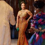 Joselyn Dumas Instagram – Dear readers… your Queen is here! 
#BridgertonNetflix 

Dress @pistisgh 
Stylist @kelvincentgh
Makeup @zamazondomakeupartistry_ 
Hair @redgingerforhair
Crown @velmasaccessories
Kente @goba_kente