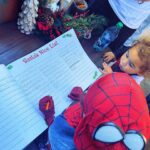 Jude Demorest Instagram - our first time meeting Santa… and Spider-Man… and Black Panther and Okeye… in the same day?! a VERY Merry Christmas to you and yours from me & mine.🤍🙏🤘🕸️❄️🎄👼🏽