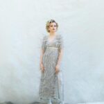 Julia Garner Instagram - La Dolce Vita in @prada. Photographer @julian_ungano.jpg 🎥 #onfilm