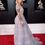 Julia Michaels Instagram – The last time Vs. The first time :) good luck to all the Grammy nominees today! ❤️❤️❤️ #grammys @recordingacademy 

Photos by Jon Kopaloff and Jamie McCarthy via Getty Images