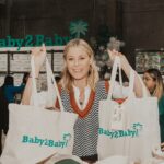 Julie Bowen Instagram - Such an incredible day volunteering at @Baby2baby packing bundles filled with diapers, hygiene items, warm jackets, toys and more for children who need it most. Sending a huge thank you to @kidoodletv for supporting my favorite nonprofit and making today possible! As a long-time Baby2Baby Board Member, I am so proud of the work we are doing to provide basic essentials to over one million children in need across the country this year.