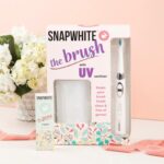 Julie Chrisley Instagram - Hey y'all! Today is the day. Freshen up your spring smile with the brightest, whitest bundle around!! This 2 piece bundle will give you a clean, sparkling smile in no time at all and includes The Brush toothbrush and The Pen whitening pens. Retail $234.99 on sale for The Chrisley Box Family for ONLY $99.95 The sonic vibrations of the The Brush with UV Sanitizer burst away plaque and remove debris while the UV sanitizer kills germs while also functioning as a storage unit for four brush heads and a charging dock for the toothbrush. The Snapwhite Teeth Whitening Pen has advanced gel that whitens BETTER and with LESS sensitivity than competing brands. It's so convenient and easy to use: just smile and brush on some gel. Teeth get whiter with each application. It's perfect for touch-ups and on-the-go whitening. This is a limited time & limited quantity offer! Order now and get this bundle in time for the perfect Mother's Day gift or to treat yourself to a refreshed pearly white smile!! These bundles will ship mid April. Happy shopping and thanks for your continued support! Julie & Savannah Link to buy in bio. #thechrisleybox #spring #chrisleys #buynow #smallbusiness #giveback #gift #giftbox #mothersday #treatyourself #smile #whitening #bundle