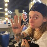 Julien Baker Instagram - 7 shows in to Wild Hearts Tour❤️ here’s a big heaping THANKS to everyone who came to the shows; to our amazing band(s) and crew(s); to Sharon, Angel, and Quinn for having me on this adventure; to @moogsynthesizers for the bloops and @boonetattoos for the ink; and to my lucky SpongeBob socks !!!🧽 (as captured by @stephportphotos )