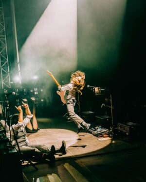 Julien Baker Instagram - This year has been so beautiful, so overwhelming, so replete with experience, so challenging and brain-bending, that I can hardly look away. I’ve been fortunate to be surrounded by people and met with situations that demand my attention, and I’ve been honored with the chance to show up for them (and lucky that @saladjockey has been there to artfully capture all the moments I most want to be awake for). I’ve been so proud to share the stage with my musical heroes and friends— prouder still at how often those two categories overlap. Every day I watch a huge community of touring professionals rely on each other to make something magical happen, and every day I get to see the gift of wonder, joy, and respite music brings to people. Thank you, thank you, thank you for another year participating in life on earth. Boygenius Fucking Rocks. 

📸 by Ashley Gellman (@saladjockey)