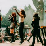 Julien Baker Instagram - This year has been so beautiful, so overwhelming, so replete with experience, so challenging and brain-bending, that I can hardly look away. I’ve been fortunate to be surrounded by people and met with situations that demand my attention, and I’ve been honored with the chance to show up for them (and lucky that @saladjockey has been there to artfully capture all the moments I most want to be awake for). I’ve been so proud to share the stage with my musical heroes and friends— prouder still at how often those two categories overlap. Every day I watch a huge community of touring professionals rely on each other to make something magical happen, and every day I get to see the gift of wonder, joy, and respite music brings to people. Thank you, thank you, thank you for another year participating in life on earth. Boygenius Fucking Rocks. 📸 by Ashley Gellman (@saladjockey)
