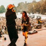 Julien Baker Instagram - This year has been so beautiful, so overwhelming, so replete with experience, so challenging and brain-bending, that I can hardly look away. I’ve been fortunate to be surrounded by people and met with situations that demand my attention, and I’ve been honored with the chance to show up for them (and lucky that @saladjockey has been there to artfully capture all the moments I most want to be awake for). I’ve been so proud to share the stage with my musical heroes and friends— prouder still at how often those two categories overlap. Every day I watch a huge community of touring professionals rely on each other to make something magical happen, and every day I get to see the gift of wonder, joy, and respite music brings to people. Thank you, thank you, thank you for another year participating in life on earth. Boygenius Fucking Rocks. 📸 by Ashley Gellman (@saladjockey)