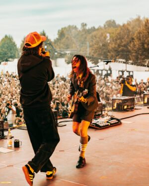 Julien Baker Instagram - This year has been so beautiful, so overwhelming, so replete with experience, so challenging and brain-bending, that I can hardly look away. I’ve been fortunate to be surrounded by people and met with situations that demand my attention, and I’ve been honored with the chance to show up for them (and lucky that @saladjockey has been there to artfully capture all the moments I most want to be awake for). I’ve been so proud to share the stage with my musical heroes and friends— prouder still at how often those two categories overlap. Every day I watch a huge community of touring professionals rely on each other to make something magical happen, and every day I get to see the gift of wonder, joy, and respite music brings to people. Thank you, thank you, thank you for another year participating in life on earth. Boygenius Fucking Rocks. 

📸 by Ashley Gellman (@saladjockey)