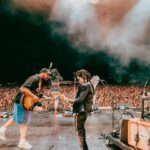 Julien Baker Instagram - This year has been so beautiful, so overwhelming, so replete with experience, so challenging and brain-bending, that I can hardly look away. I’ve been fortunate to be surrounded by people and met with situations that demand my attention, and I’ve been honored with the chance to show up for them (and lucky that @saladjockey has been there to artfully capture all the moments I most want to be awake for). I’ve been so proud to share the stage with my musical heroes and friends— prouder still at how often those two categories overlap. Every day I watch a huge community of touring professionals rely on each other to make something magical happen, and every day I get to see the gift of wonder, joy, and respite music brings to people. Thank you, thank you, thank you for another year participating in life on earth. Boygenius Fucking Rocks. 📸 by Ashley Gellman (@saladjockey)
