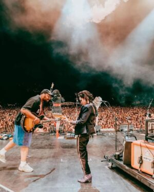Julien Baker Instagram - This year has been so beautiful, so overwhelming, so replete with experience, so challenging and brain-bending, that I can hardly look away. I’ve been fortunate to be surrounded by people and met with situations that demand my attention, and I’ve been honored with the chance to show up for them (and lucky that @saladjockey has been there to artfully capture all the moments I most want to be awake for). I’ve been so proud to share the stage with my musical heroes and friends— prouder still at how often those two categories overlap. Every day I watch a huge community of touring professionals rely on each other to make something magical happen, and every day I get to see the gift of wonder, joy, and respite music brings to people. Thank you, thank you, thank you for another year participating in life on earth. Boygenius Fucking Rocks. 

📸 by Ashley Gellman (@saladjockey)