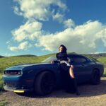 Juliette Lewis Instagram – A girl & her Ride. @dodgeofficial A love story. 💙 (I know the banana tags are still on I like the way they look!)