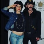 Juliette Lewis Instagram – Remembering Lemmy on the day of his passing… I have a few exceptional experiences with this King. The biggest one was when he invited me to sing back up on the song “Killed by death”. My band played with Motörhead opening for the Foo Fighters in Hyde Park in the UK. (you can have a little YouTube dive and see) I was terrified to be on stage with Motörhead in front of that many people, but that was a time in my life I was on a mission to JUST SAY YES to any soul expanding creative opportunity -fear be damned – so there I was with a nice Brazilian girl (Lemmy’s friend) who coached me along as we scream-sung “Killed by death!” into the microphone in front of 75,000. All you could hear and feel on stage were the buzzing of wall-to-wall Marshall amps. It was a electrifying and I’m sure I left my body as I levitated off the stage. 😃 
one of the most amazing things also was how gentlemanly and soft-spoken he was offstage, and the sheer force he was on.