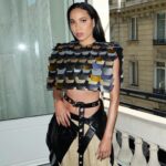 Jurnee Smollett Instagram - This structured piece by the brilliant @nicolasghesquiere for @louisvuitton truly makes me feel like a warrior. Love it sooo much!! #pfw #louisvuitton (Sidenote: yes, @makeupvincent told me to hang out the window…and yes she obliged. We had to get the picture hunty! 🤪🤪)