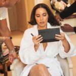 Jurnee Smollett Instagram - @jurneesmollett pregamed the @louisvuitton Spring 2024 show with a Beyoncé playlist and hot lemon water. In attendance, she wore a windbreaker-esque sleeveless jacket complete with a hood, juxtaposed with high-waisted fire-engine-red skinny pants, and topped it all off with a link-belt of exaggerated proportions across her midriff. “He finds a way within his silhouettes to create such a dance between the energies of the feminine and the masculine,” she muses about Louis Vuitton’s Creative Director @nicolasghesquiere. At the link in bio (or at coveteur.com), we get ready with Jurnee in her Paris hotel moments before the big show. Photographer: @artofv Writer: @camille_freestone Creative Producer: @talunzeitoun Stylist: @mandelkorn Hair Stylist: @naivashaintl Makeup Artist: @makeupvincent Location: @lebristolparis #LouisVuitton #JurneeSmollett