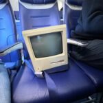Justine Ezarik Instagram - Hahahaha I’d say the highlight was taking this old 1984 Mac to the Apple Spaceship park, but it was pretty awesome getting to sit in the cockpit for a photo 😂😂😂