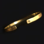 Kali Hawk Instagram - 🙆🏽Many times I've been described by friends as lucky (🤔and I always feel lucky), so when designing this piece I wanted it to look Lucky, too. Through a special process ⚒ I gave "The Lucky One" #cuff a nice #patina and the subtle matte finish of a #happy surprise buried deep in the sand 🏖and dug up by a #child on vacation.🎉To add some lucky powers, after making the #bracelet, I wore it. Then, 😯after telling a #friend about a particular man I wanted to see, I ran into the man, 👀who it turns out is even luckier than I am! Playing #ExtremeSports his whole life, 🏂he had joyfully walked from one #dangerous situation to the next either unscathed, or with speedy recovery. 🙇🏻In fact, people call him #Wolverine because of his self-healing abilities #Lol 💃🏽We ended up going to dinner 🍝and I let him wear The Lucky One cuff. 🙈He didn't want to take it off! He said it was so #comfortable he forgot he was wearing #jewelry, 💁🏽which was lovely to hear, and lovely to know he'd left some of his #SuperPowers & good luck on the bracelet to intermingle with mine. *Made of #18k #RoyalGold The Lucky One cuff is perfect for engraving✍🏾 and with its one 💎sparkling champagne #diamond 😌it's understated enough to be worn by both women and men. It was a #joy to make this bracelet for the @PureEarthNow auction to #promote safe goldmining practices worldwide.🌍✨ 🙋🏽This bracelet is imbued with the #energy of healing, joy, #miracles, success, #love and the glowing warmth of fairmined #gold from Hoover & Strong. 🔮May it bring #GoodLuck and great #fortune to whoever wins it!💋