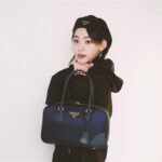 Kang Mi-na Instagram - Prada’s Re-Nylon is regenerated nylon created through the recycling and purification of plastic collected from the ocean. #PradaReNylon #Prada #ad 🤍🖤🐬