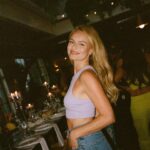 Kate Bosworth Instagram - Lavender crop on film @tiarabellaaa breaking hearts in our yellow cargo pants / crop duo ⚡️⚡️⚡️dropping @roxy tomorrow…… 👀