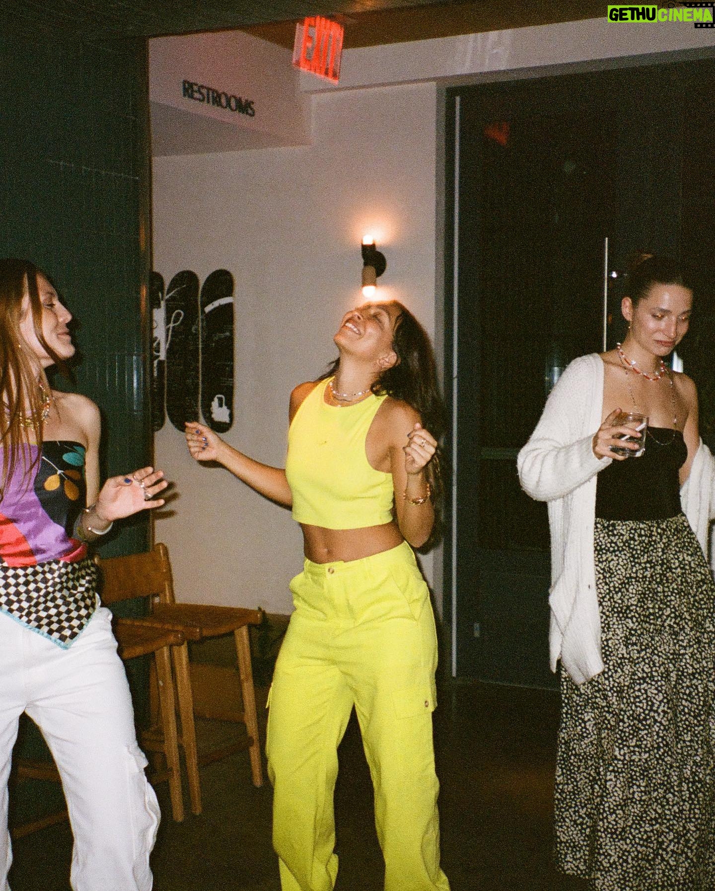 Kate Bosworth Instagram - Lavender crop on film @tiarabellaaa breaking hearts in our yellow cargo pants / crop duo ⚡️⚡️⚡️dropping @roxy tomorrow…… 👀