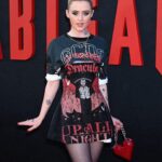 Kathryn Newton Instagram – I love ballet 🩰 @abigailthemovie thank you @giulianocalza @gcdswear and @officialuniversalmonsters for this perfect Dracula dress to celebrate @abigailthemovie The tattoos are Sammy’s from the film and the tiara I’ve had since I was like 8. Getting ready with @bridgetbragerhair and @ginabrookebeauty felt like Halloweennnnn
