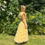 Katie Piper Instagram - Chelsea Flower Show 🌼🪴 Yesterday I supported a unique social enterprise @the_rhs, The Glasshouse. @theglasshousebotanics gives women in prison second chances by teaching them how to care for houseplants, so on release they have better employment opportunities making them more employable and less likely to reoffend.  I got to meet some of the women today and hear their stories of survival and reinvention. They have not only turned their own lives around but are mentoring other women to do the same. This is a fantastic scheme that truly works and I felt so hopefully and happy for all of the women involved 💛 Shout out to @malverngardenbuildings for sponsoring this initiative and believing in all of those involved 🙌 Hair @mauriceflynn Make up @toby_salvietto Styling @harrietnicolsonstylist Dress: @needleandthreadlondon Shoes: @malonesouliers Bag: @marni via @coggles Earrings: @needleandthreadlondon X @sorujewellery collab Sunglasses : @robertlaroche