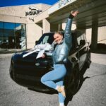 Katrin Tanja Davidsdottir Instagram – We bought our dream car! 😭😭✨ The third slide is from three years ago when we were getting my car serviced & we first saw an all-black Defender .. I took a photo of @brookslaich sitting in it & thought 💫ONE DAY💫

Since moving to Coeur d’Alene, we have been sharing one vehicle, so it also feels like I just grew wings! 🤍🪽 I AM SO HAPPY & thankful & excited for all the adventures to come in this one with my love!!!!!!!!
