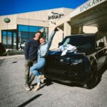 Katrin Tanja Davidsdottir Instagram – We bought our dream car! 😭😭✨ The third slide is from three years ago when we were getting my car serviced & we first saw an all-black Defender .. I took a photo of @brookslaich sitting in it & thought 💫ONE DAY💫

Since moving to Coeur d’Alene, we have been sharing one vehicle, so it also feels like I just grew wings! 🤍🪽 I AM SO HAPPY & thankful & excited for all the adventures to come in this one with my love!!!!!!!!