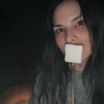 Katrina Law Instagram - Happy New Year! Might be in the middle of the woods next to the ocean while a bomb cyclone is about to hit…but the marshmallows are delish😋 Trying to look cute while holding a marshmallow is a low and apparently unattainable goal. #california #bigsur