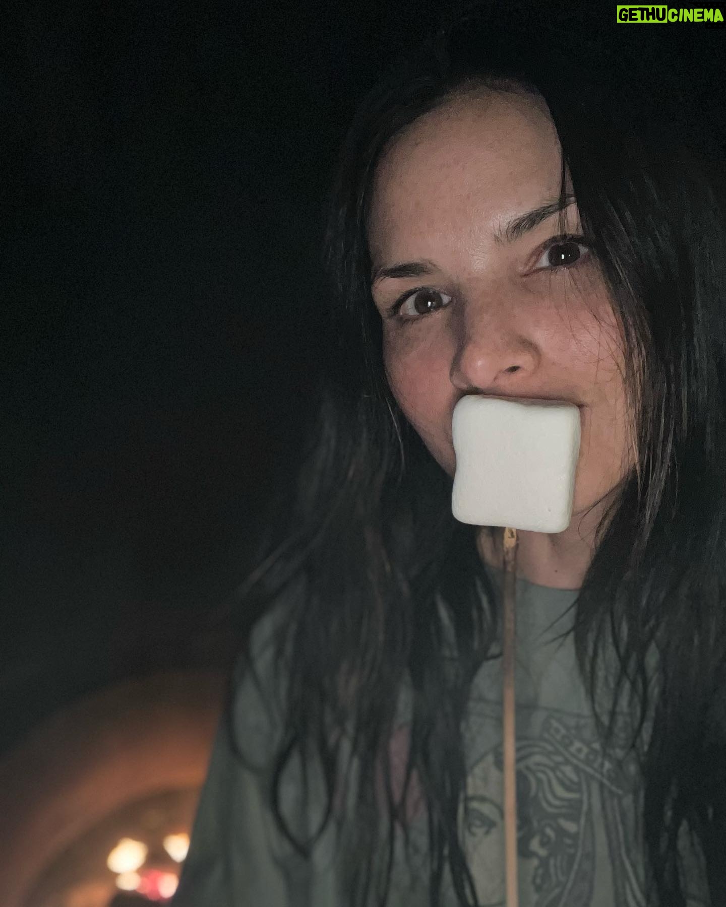 Katrina Law Instagram - Happy New Year! Might be in the middle of the woods next to the ocean while a bomb cyclone is about to hit…but the marshmallows are delishđŸ˜‹ Trying to look cute while holding a marshmallow is a low and apparently unattainable goal. #california #bigsur