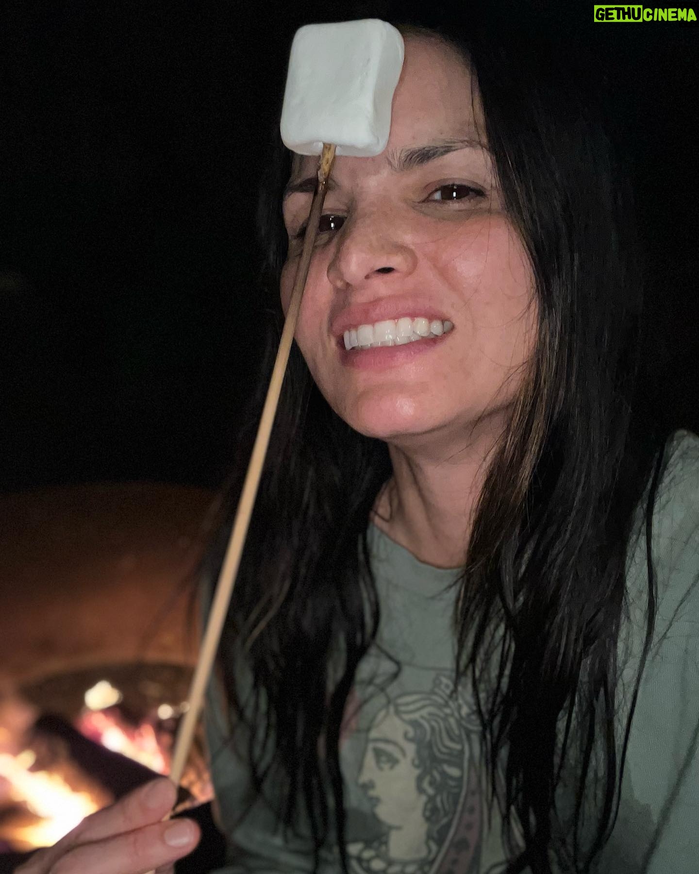 Katrina Law Instagram - Happy New Year! Might be in the middle of the woods next to the ocean while a bomb cyclone is about to hit…but the marshmallows are delishđŸ˜‹ Trying to look cute while holding a marshmallow is a low and apparently unattainable goal. #california #bigsur