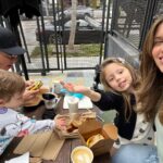 Kayla Ewell Instagram – The boys are eating. The girls are smiling. Looks like we each got a mini me. 😊