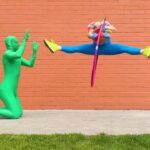 Kelli Erdmann Instagram - I can’t jump like I used to 😅 #stitch with @the7fingers 😍 #hulahoopchallenge #happykelli #hulahoop #dance #splitjump #trick