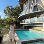 Kelly Jean Killoren Instagram – #NewsWorthyHomeOfTheDay- $13.4M Malibu Architectural Marvel by Harry Gesner 🌟

Perched atop a 1-acre hill with unparalleled Pacific Ocean vistas, 21056 Las Flores Mesa Dr is a testament to architectural mastery and the genius of Harry Gesner.

NewsWorthy Features:

🛏️ 3 Bedrooms & 🛁 3 Baths enveloped in modern-Gothic elegance
🏰 Striking Gothic arches & 30-foot wood-beam ceilings frame the ocean’s majesty
🖼️ Towering glass walls & glass-encased terraces offer immersive outdoor living
🌴 Outdoor oasis with a pool, jacuzzi, & a restored 1957 Airstream trailer for unique retreats
🎨 Exposed beams, wood-paneled ceilings, & stone flooring blend warmth with grandeur
🌅 Vast sitting areas & innovative design make every sunset an event
🚗 Minutes from PCH, blending seclusion with coastal accessibility

A masterwork of form and function, this Malibu icon invites you to live within a piece of architectural history, where every detail celebrates the harmony between human ingenuity and the natural world. 

Check out 21056 LAS FLORES MESA DRIVE MALIBU, CA 90265 listed by Kelly Bensimon @kellybensimon,
Marcy Roth @marcyroth and Fredrik Eklund @fredrikeklundny by clicking the link in our Bio.

⭐️Follow 👉@NewsWorthyHomes for a daily showcase of the most exceptional, noteworthy homes brought to you by the World’s Top Realtors, Builders, Architects, and Designers🌟

#mansions #luxury #mansion #architecture #realestate #luxuryhome #luxuryrealestate  #luxuryhome #mansiongoals #luxurymansion #luxuryhouses #property #homes #mansionhomes  #luxurymansions #luxurylistings #forsale #luxuryrealestate #newsworthyhomes #luxuryrealtors