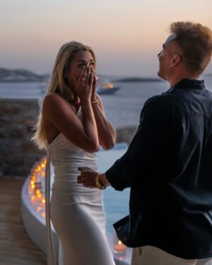 Kelsey Owens Instagram - WE’RE ENGAGED BABY!!!💍🤍

It’s crazy that a day I’ve dreamt about since I was a little girl has arrived. I think the younger me would be so happy to know she has a man who takes care of her, puts a smile on her face, and loves her like no one ever has before. 

Max…since the day I met you, you’ve never failed to surprise me and this day was NO different. You make my life like a fairytale so I truly thought this was just another night together shooting photos in a gorgeous location. Little did I know you were about to change my life forever.

The idea of us starting a family, having a lifetime of adventures, and getting to laugh with you every single day till the day I die brings happy tears to my eyes. I feel like the absolute luckiest girl in the world to be your fiancé and future wifey ♥️

Thank you so much @kieferjewelers for helping Max pick out my dream ring, I can’t stop looking at it 🥹

📍@cavotagoomykonos
📷 @jeremyaustiin