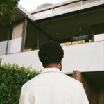 Khalid Instagram - I’m so blown away by all the love 🖤 it’s crazy how one minute you’re anxiously holding onto something so special to you, and then the next minute it’s living out in the world! What’s your favorite lyric from Please Don’t Fall In Love With Me?